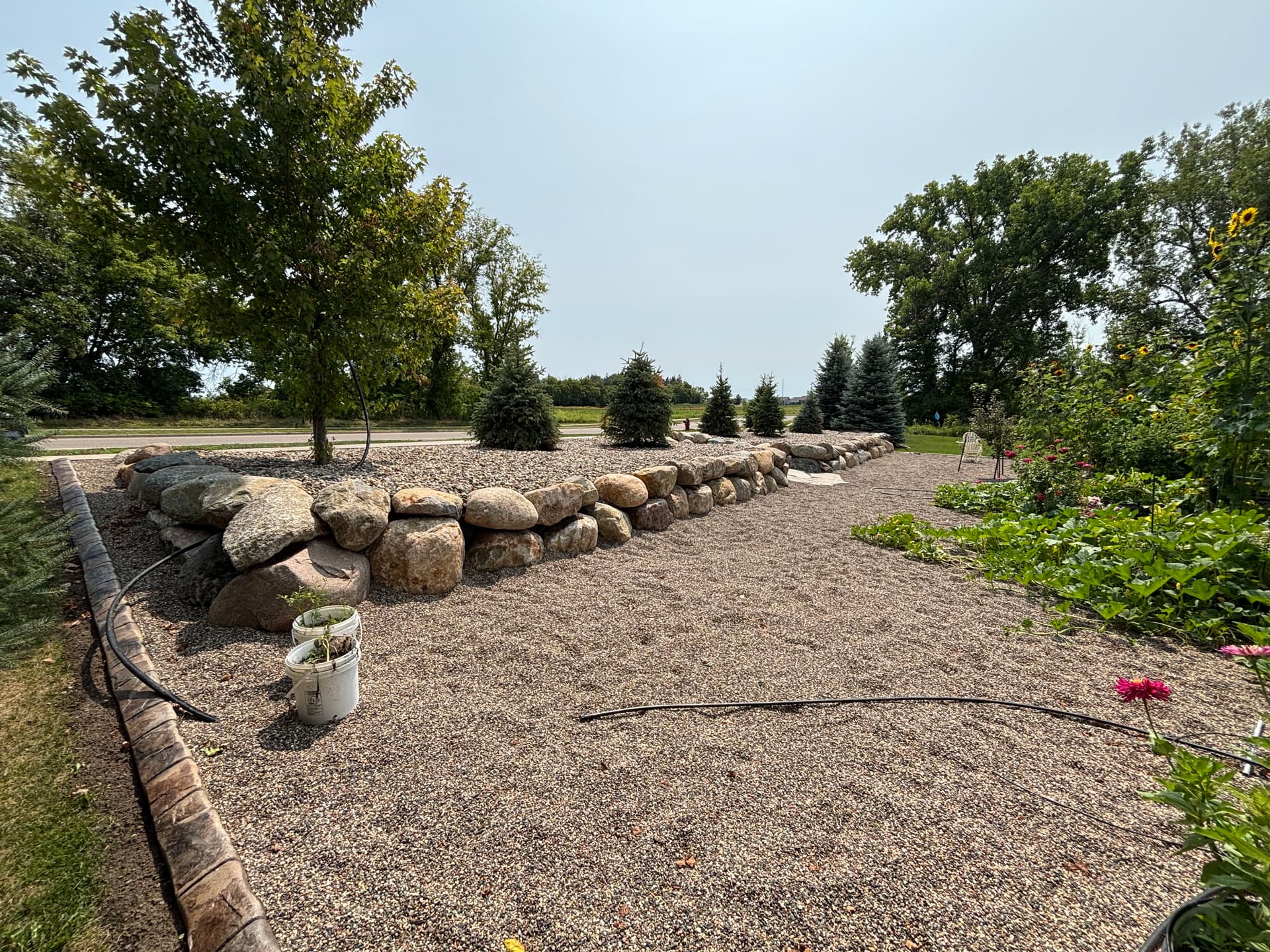 Gallery photos for Boulder Walls and Natural Stone Walkway Turn a Sloped Hillside Into Usable Space: Image #2