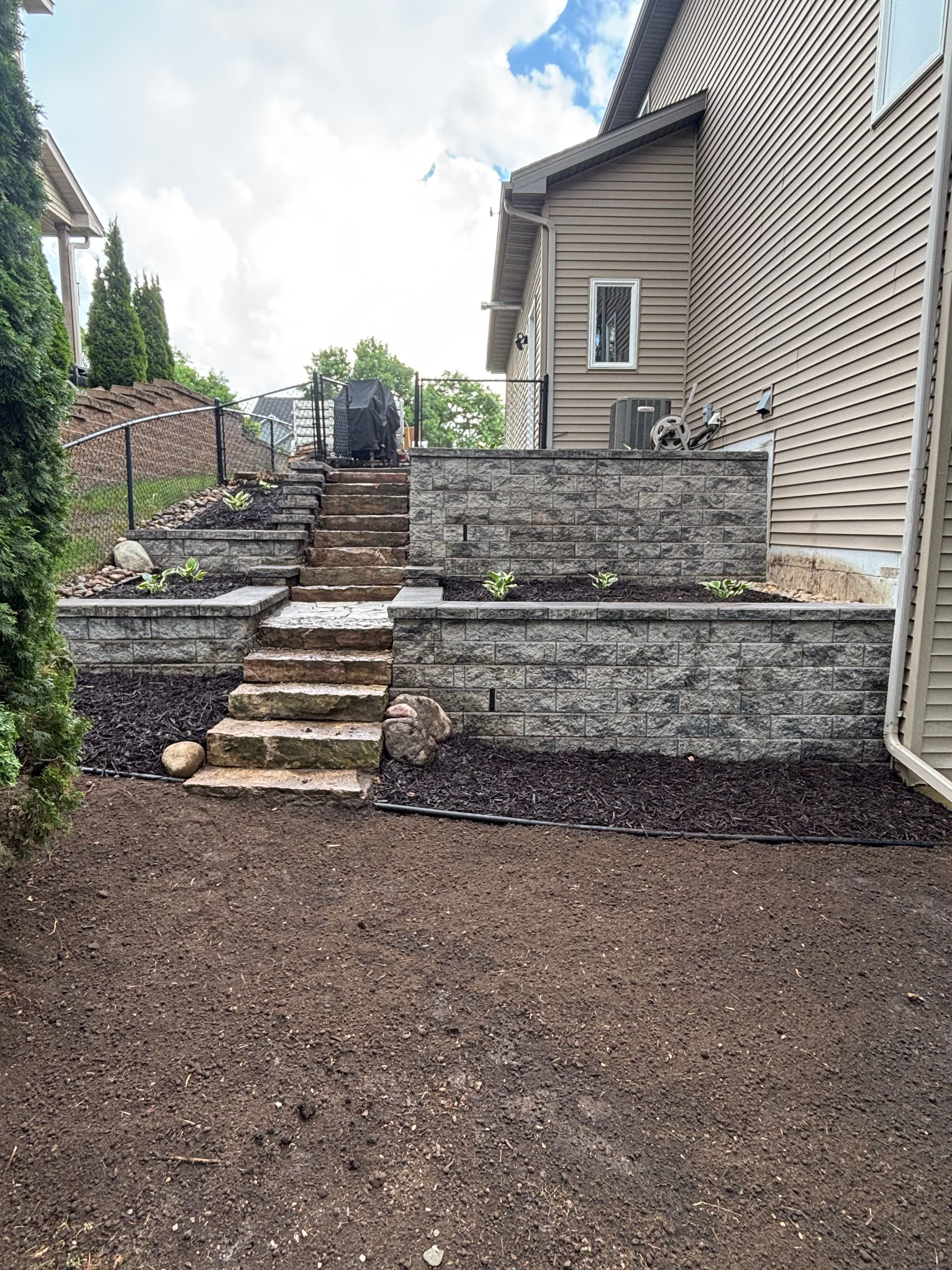 Project Failing Retaining Wall Gets a Complete Hardscape Overhaul image