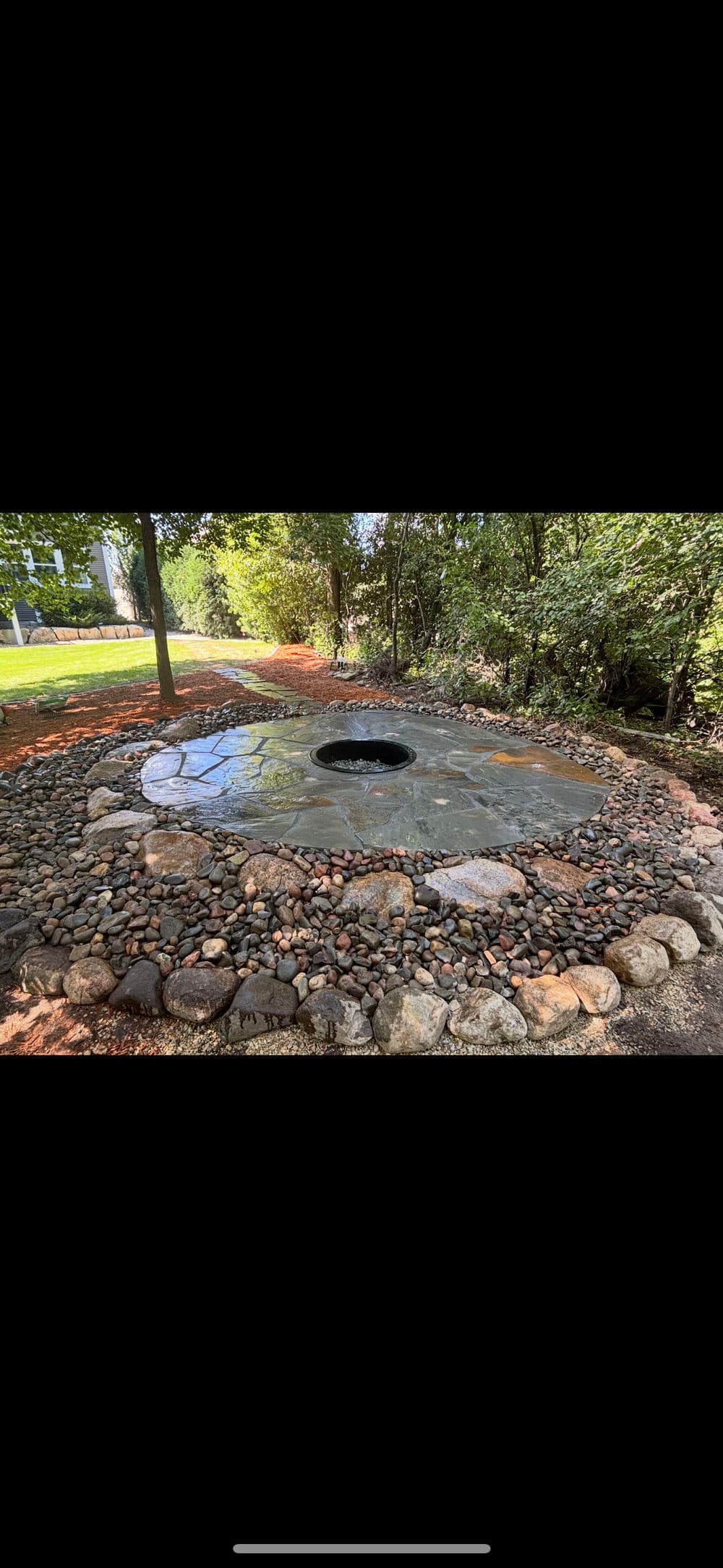 Project Backyard Stone Fire Pit Area in Rosemount image