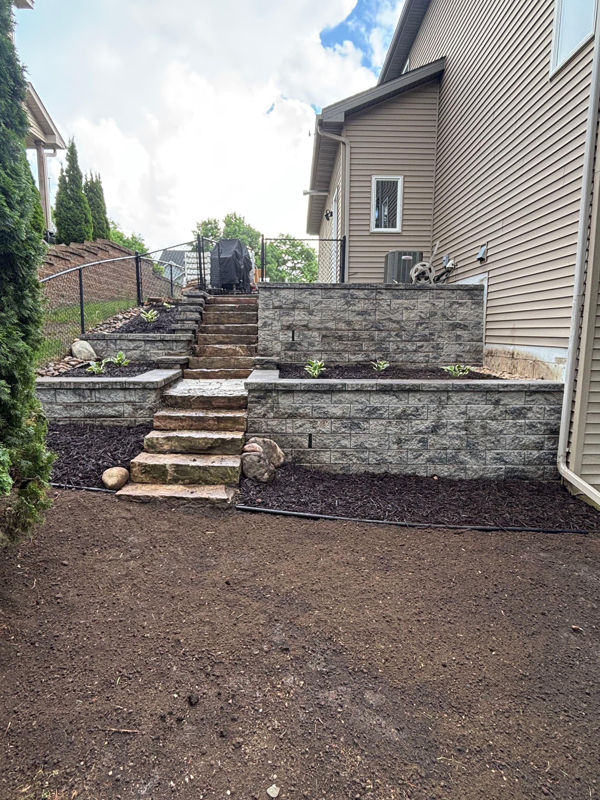 Failing Retaining Wall Gets a Complete Hardscape Overhaul image