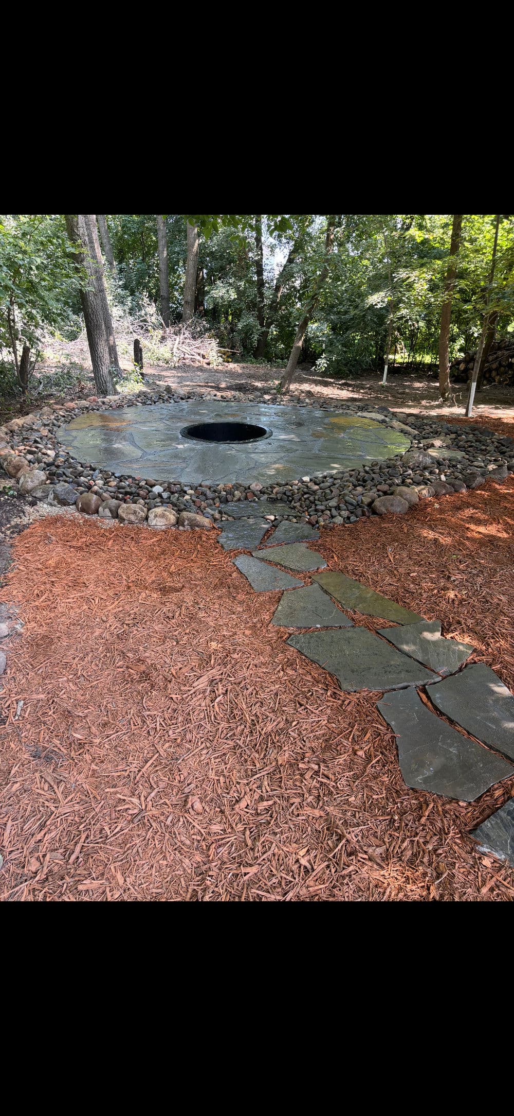 Gallery photos for Backyard Stone Fire Pit Area in Rosemount: Image #1