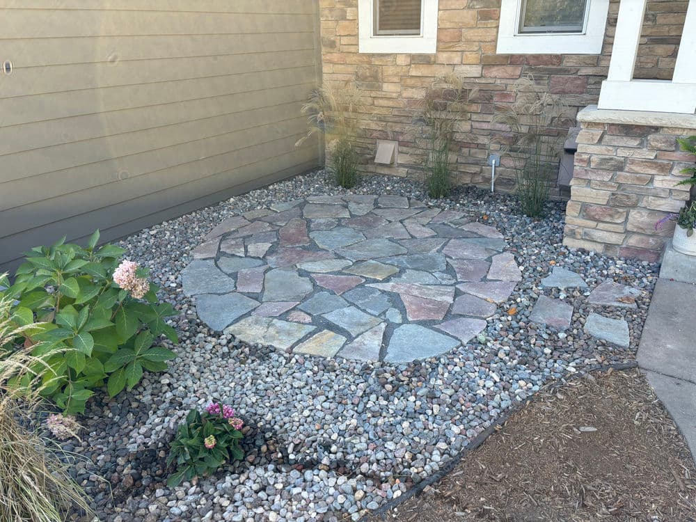 Gallery photos for Flagstone Patio Installation with River Rock Touches in Inver Grove Heights: Image #1