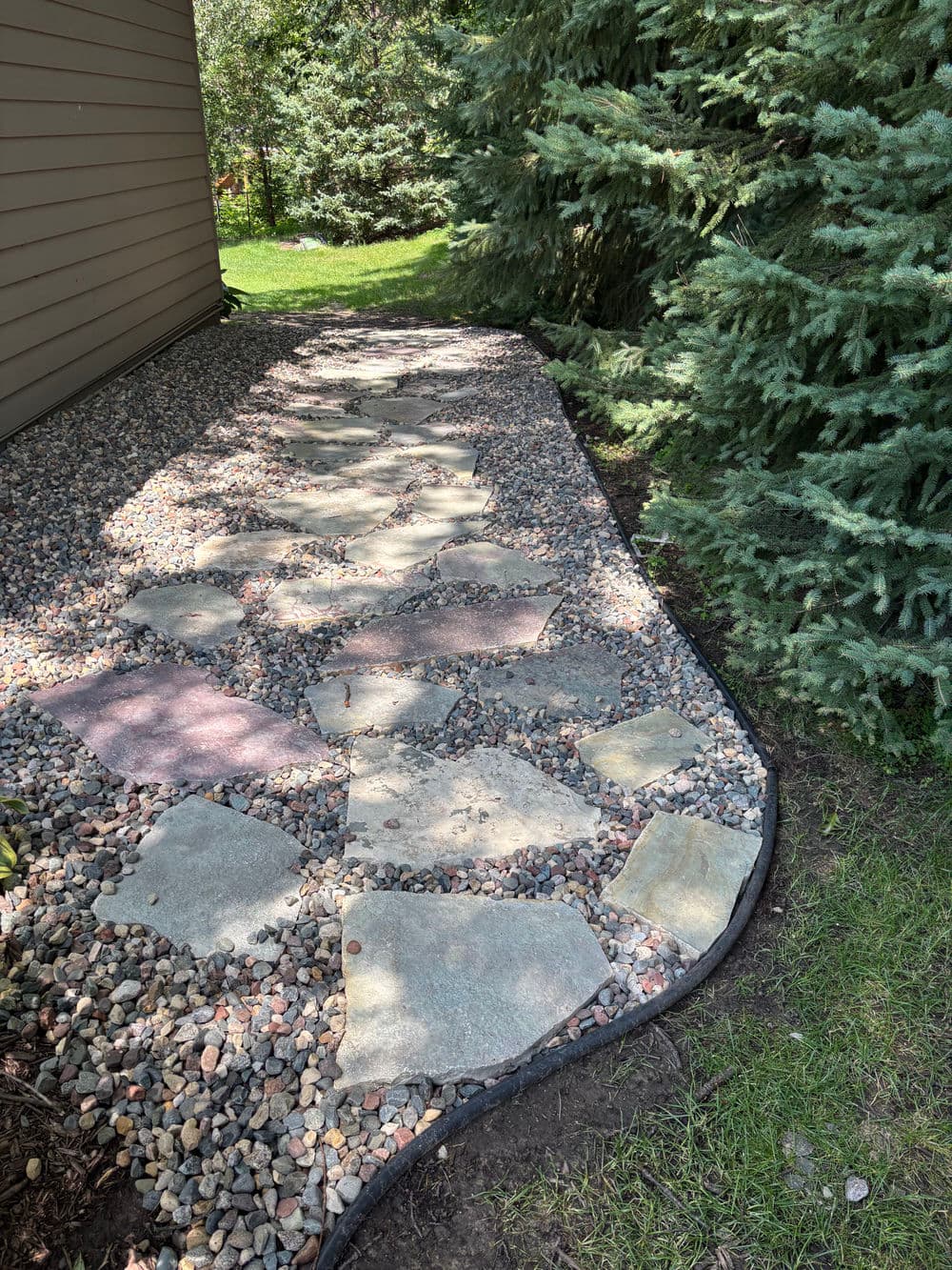 Gallery photos for Flagstone Patio Installation with River Rock Touches in Inver Grove Heights: Image #2